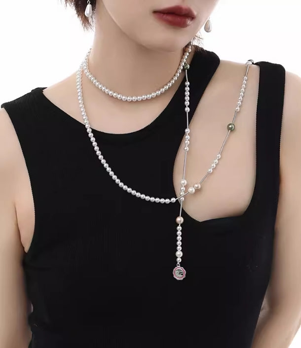 Stacked clavicle long pearl necklace