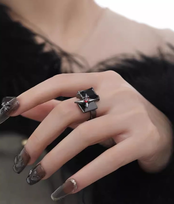 Geometric four-pointed star open ring