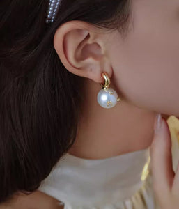 Celebrity-style pearl earrings