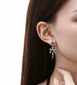 Black zircon snowflake long earrings