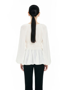 Flowing yarn pleated shirt