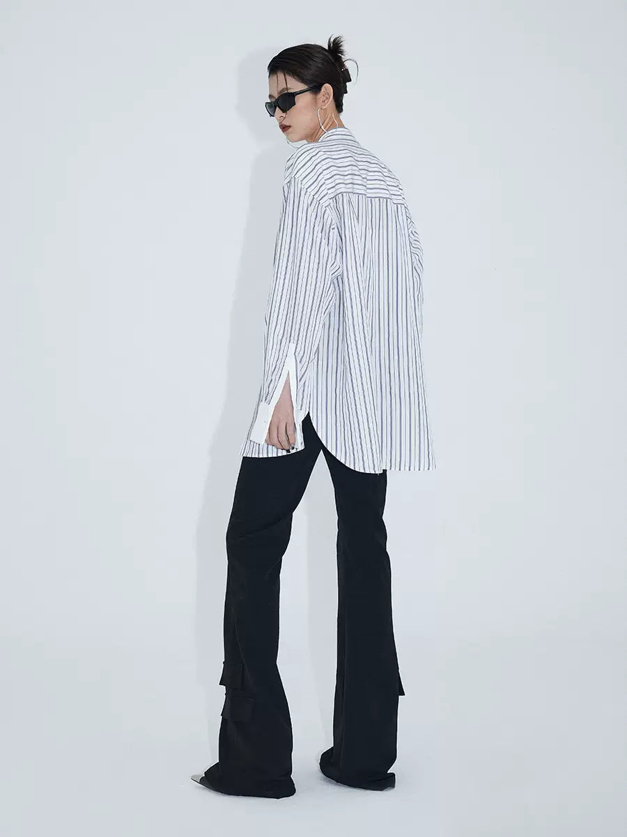 Minimalist waist asymmetric pocket flared pants