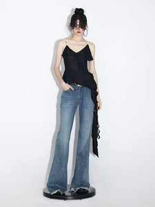 Low-rise loose-fitting flared wide-leg jeans