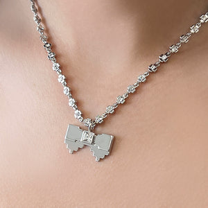 Gem-encrusted Silver Bow Necklace