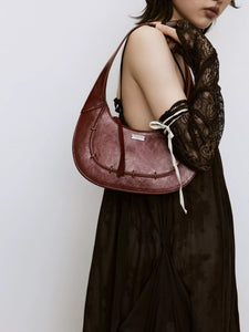 Burgundy leather patchwork shoulder crescent bag