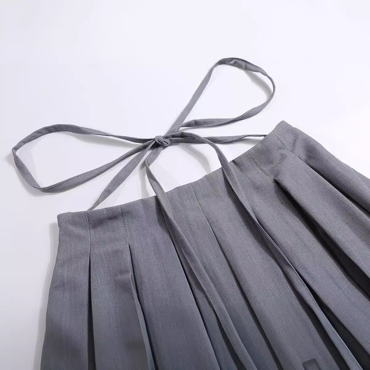 Pleated bow tie skirt