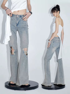 Knee ripped raw hem bootcut jeans