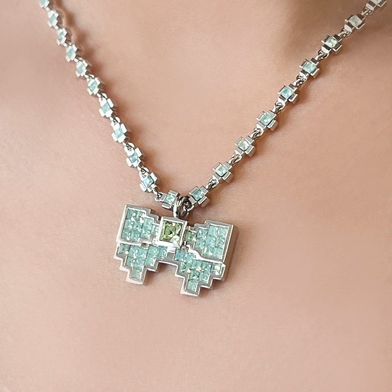 Gem-encrusted Silver Bow Necklace