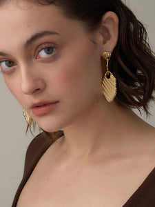 Spliced long earrings