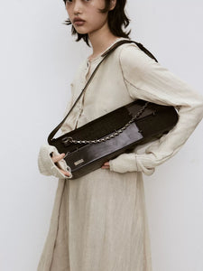 Black cowhide horsehair patchwork baguette bag