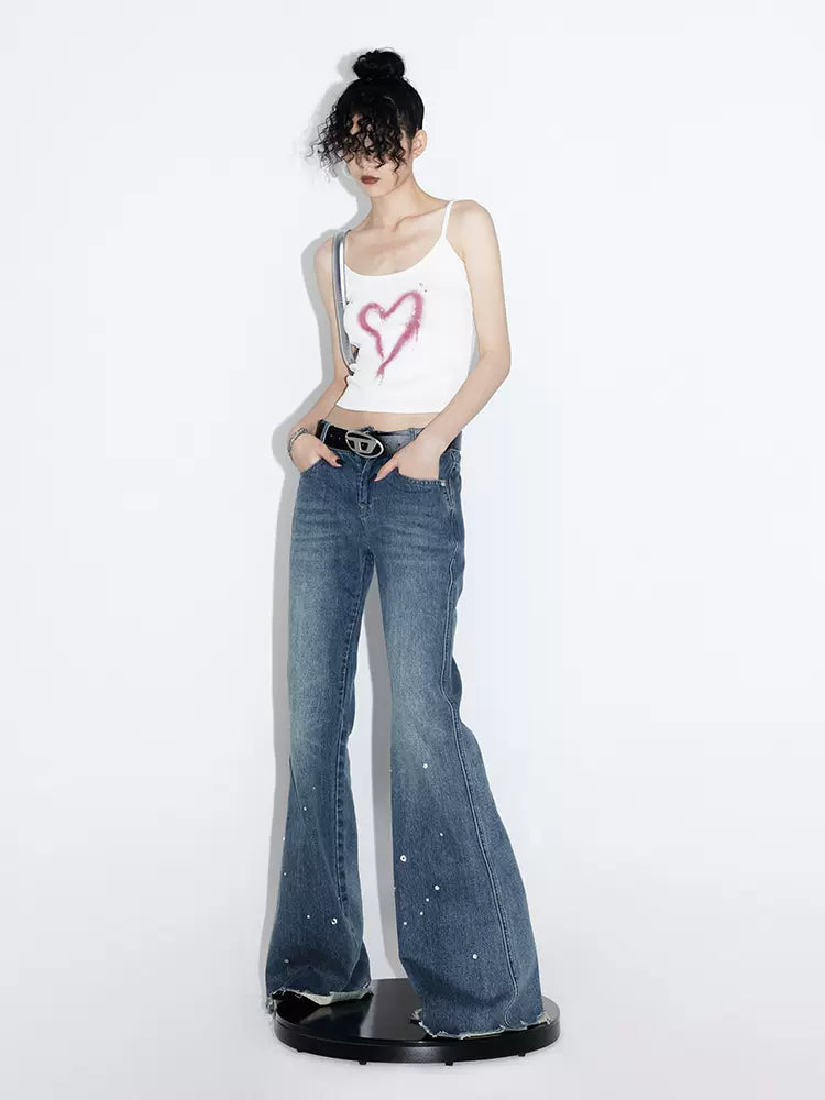 Low-rise loose-fitting flared wide-leg jeans