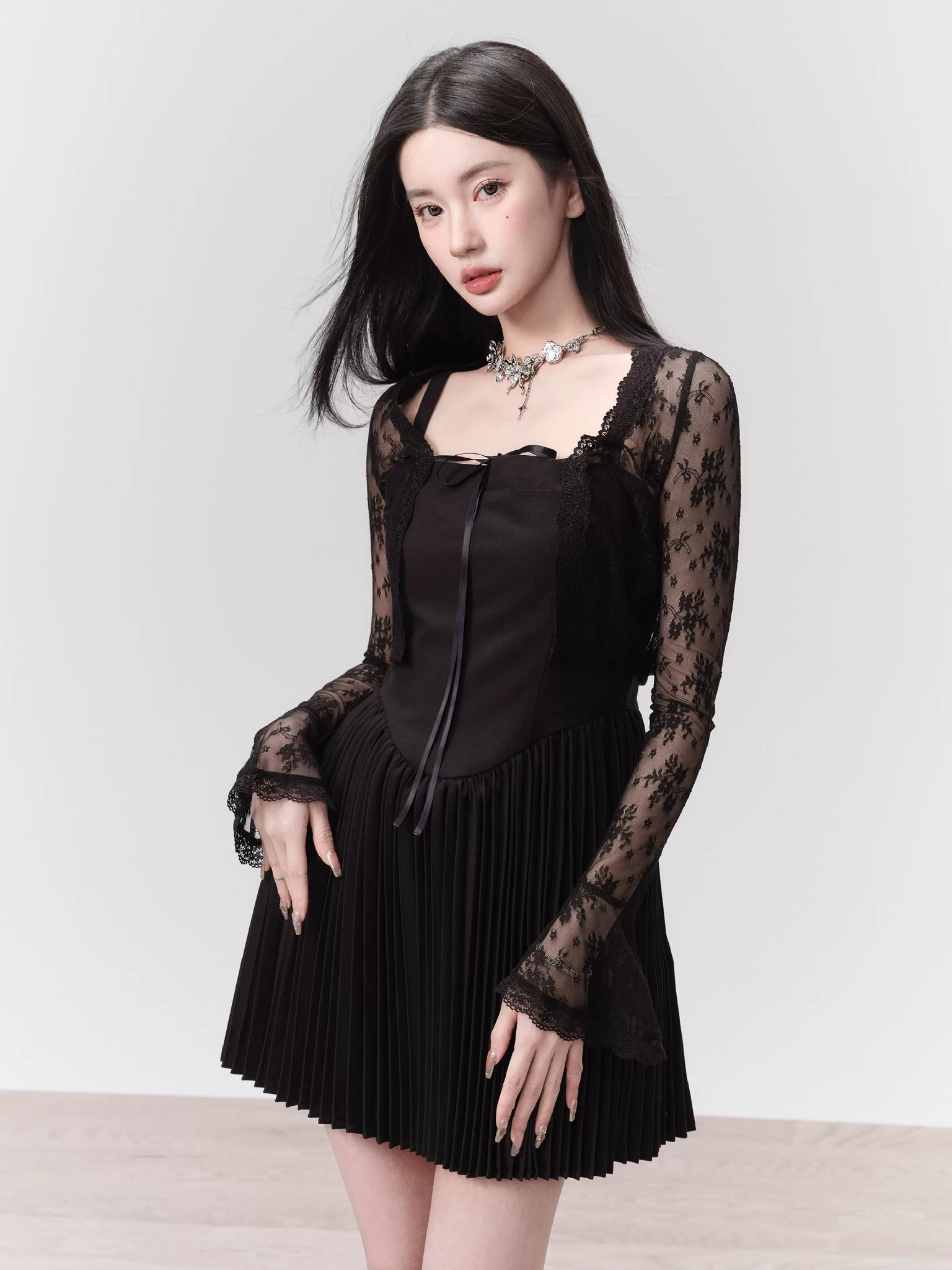 Silky black pleated summer date suspender dress