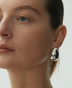 Egg-shaped silver earrings