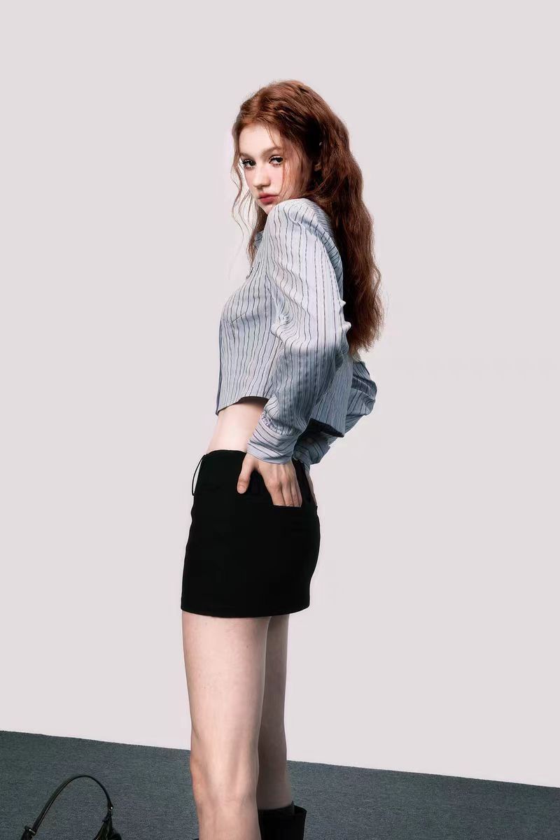 Black ultra-short hip-hugging suit skirt high-end retro hot girl slim A-line skirt